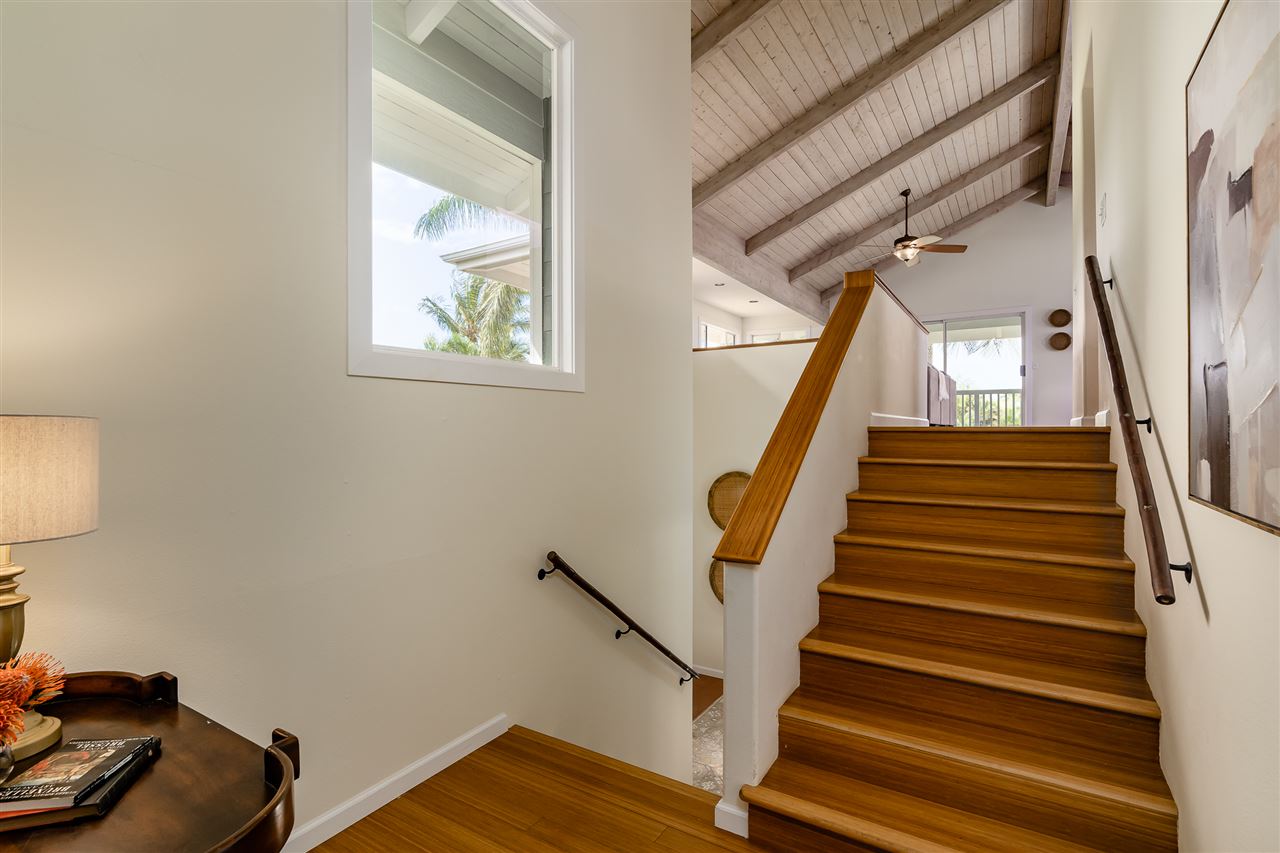 3175 Ua Noe Place, Unit A Haiku, HI 96708 - Photo 15 of 29 a view of entryway and hall with wooden floor