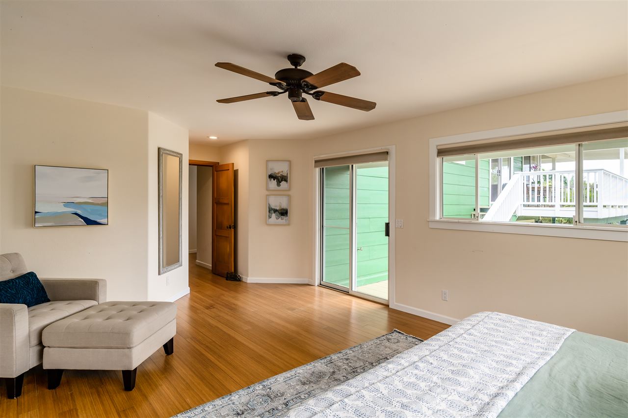 3175 Ua Noe Place, Unit A Haiku, HI 96708 - Photo 19 of 29 a bedroom with a bed and a couch