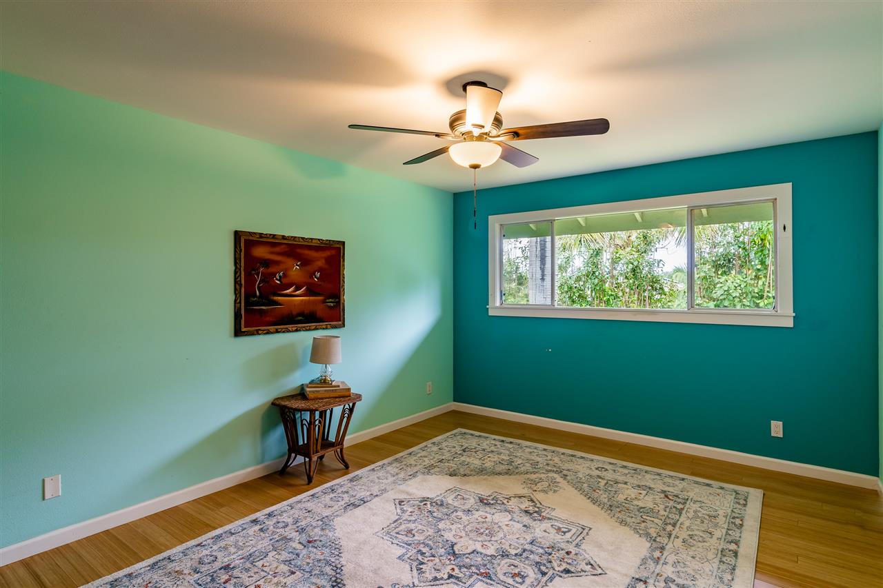 3175 Ua Noe Place, Unit A Haiku, HI 96708 - Photo 20 of 29 a room with furniture and a window