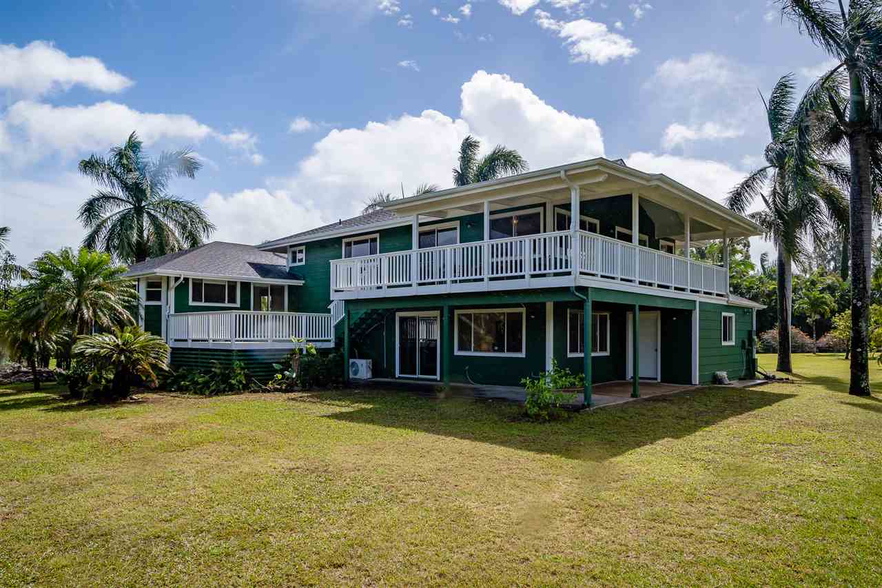 3175 Ua Noe Place, Unit A Haiku, HI 96708 - Photo 2 of 29 a front view of a house with a yard