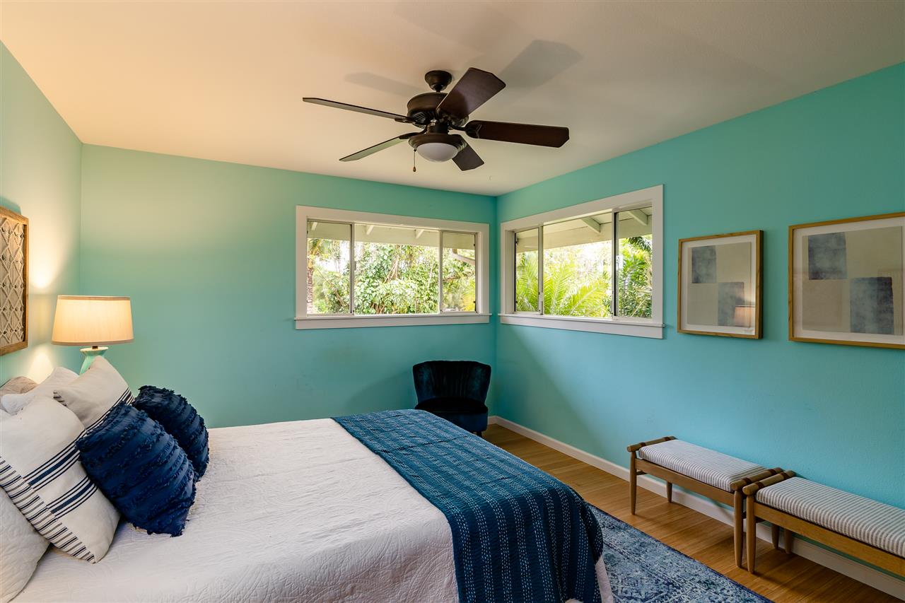 3175 Ua Noe Place, Unit A Haiku, HI 96708 - Photo 21 of 29 a bedroom with a bed and a window