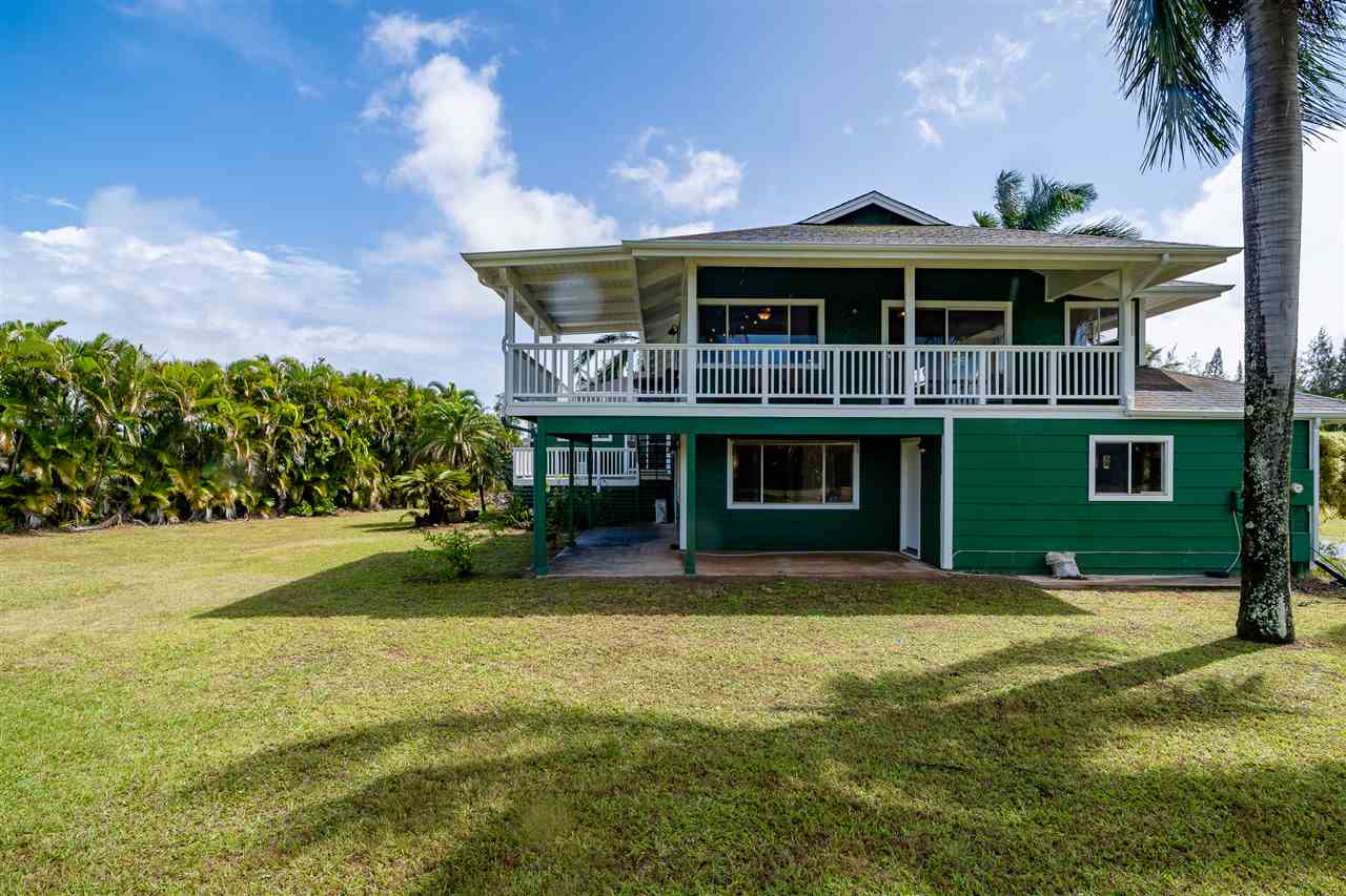 3175 Ua Noe Place, Unit A Haiku, HI 96708 - Photo 28 of 29 a view of a house with a yard and potted plants