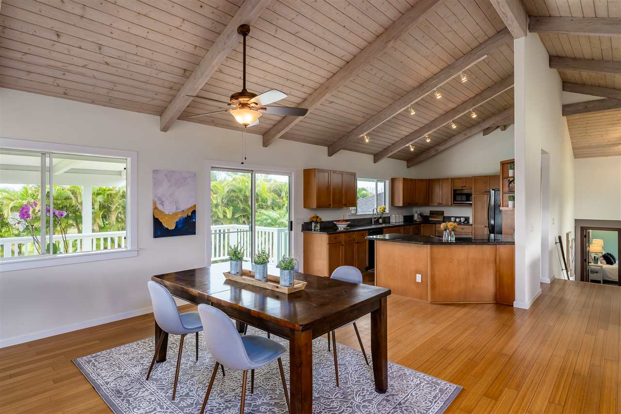 3175 Ua Noe Place, Unit A Haiku, HI 96708 - Photo 6 of 29 a view of a dining room with furniture window and wooden floor