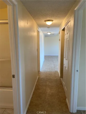 a view of hallway with shower