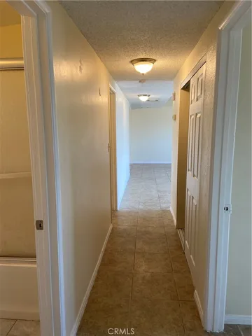 a view of hallway with shower