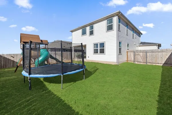 a house view with a garden space