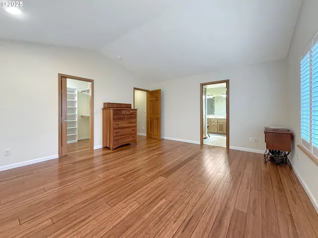 a view of a livingroom with wooden floor