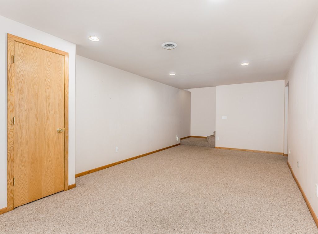 265 Rollin Road Somonauk, IL 60552 - Photo 31 of 33 an empty room with a empty space and a window