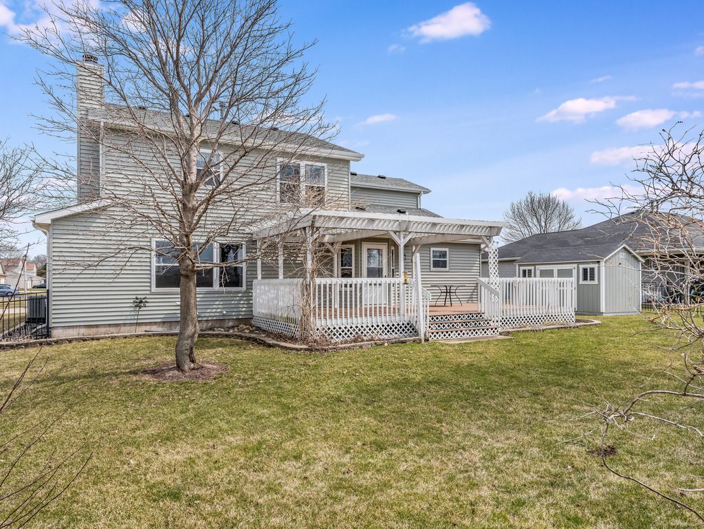265 Rollin Road Somonauk, IL 60552 - Photo 33 of 33 a view of a house with a yard