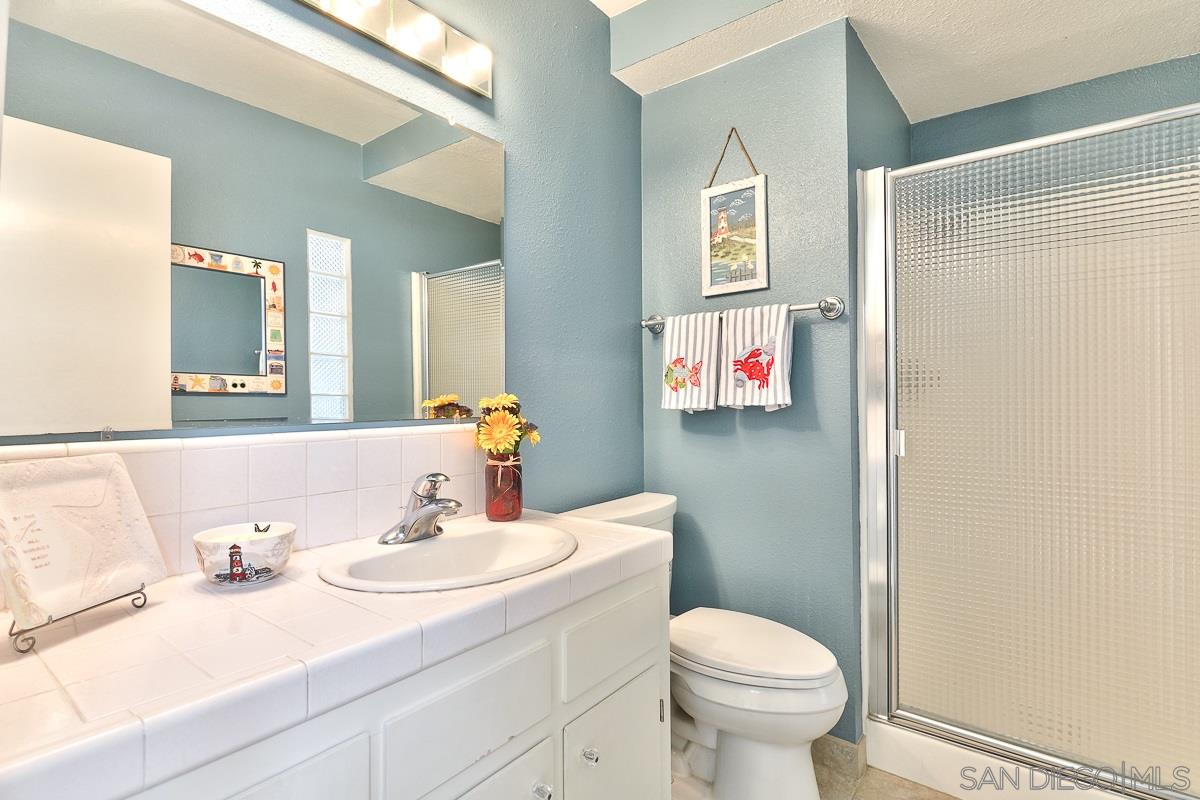 13330 Rollin Glen Road Poway, CA 92064 - Photo 14 of 25 Bathroom with shower located next to the Family Room.