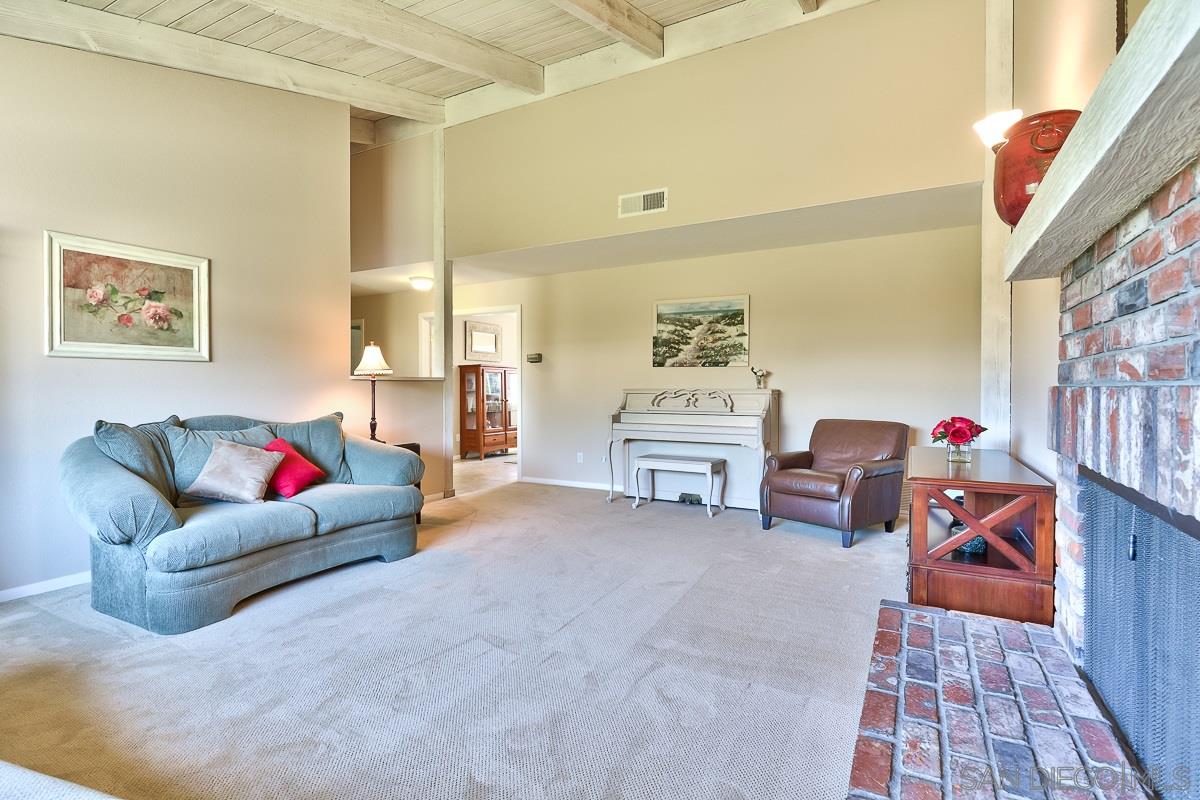 13330 Rollin Glen Road Poway, CA 92064 - Photo 3 of 25 Living Room looking into Formal Dining Room.