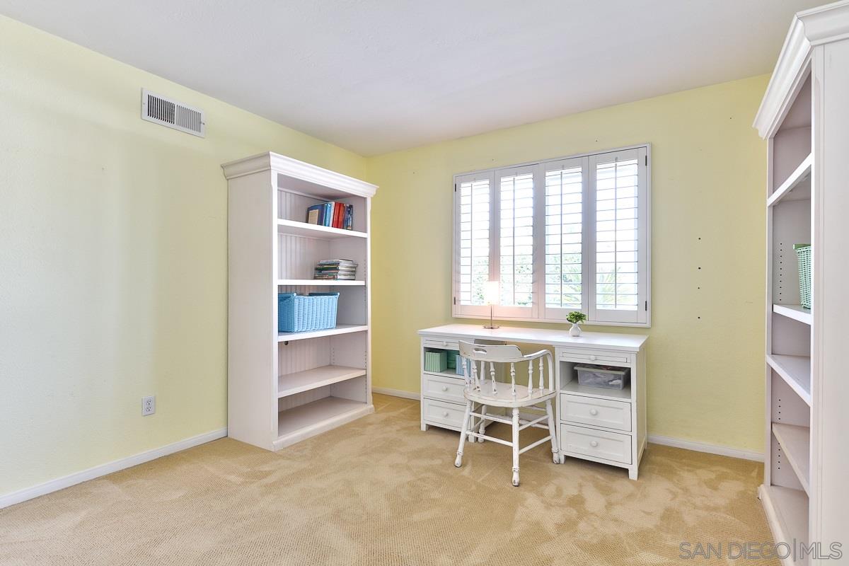 13330 Rollin Glen Road Poway, CA 92064 - Photo 22 of 25 Bedroom has plantation Shutters and walk in closet.