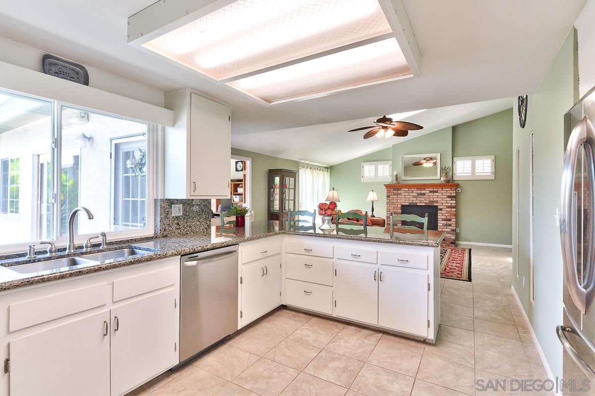 13330 Rollin Glen Road Poway, CA 92064 - Photo 8 of 25 Kitchen looking into Family Room.