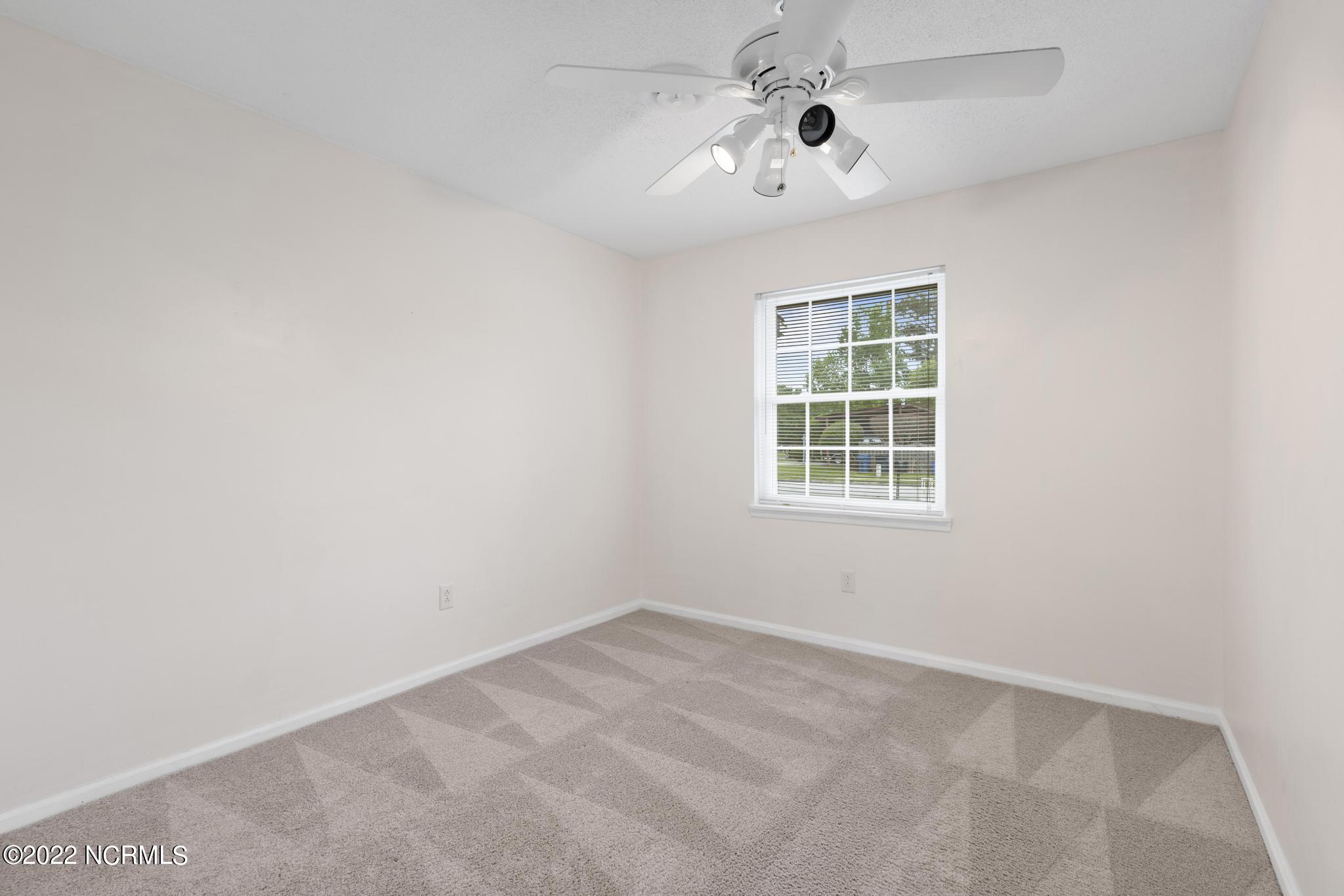211 Dennis Road Jacksonville, NC 28546 - Photo 16 of 25 Guest Bedroom