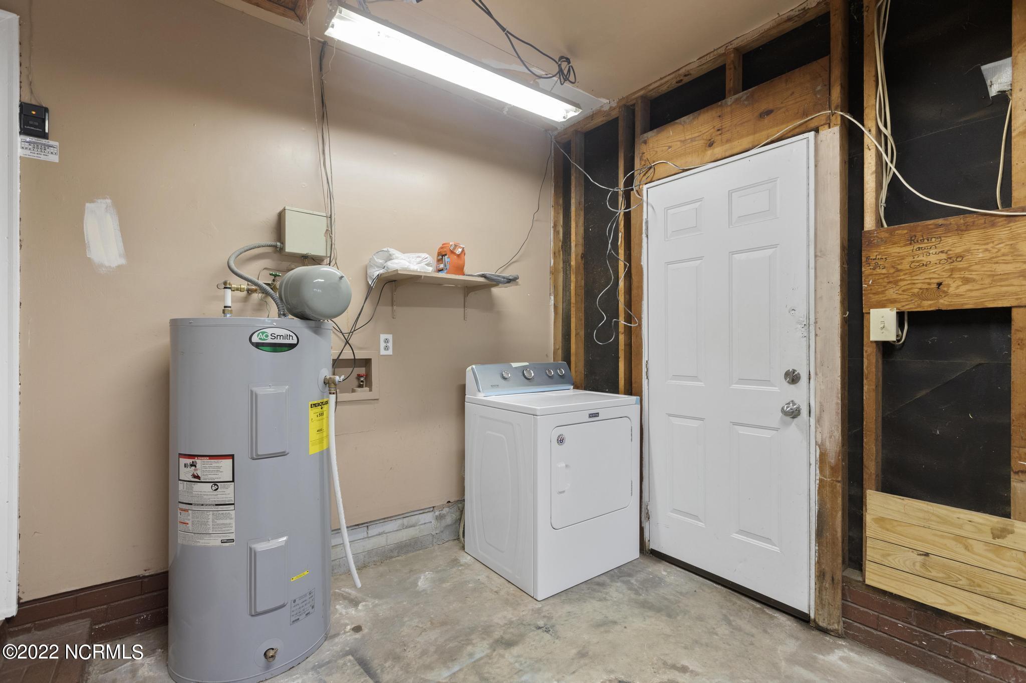 211 Dennis Road Jacksonville, NC 28546 - Photo 21 of 25 Garage/Laundry Area
