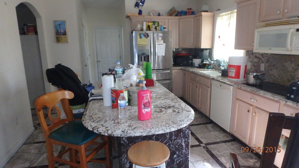 11 Saffron Drive Worcester, MA 01605 - Photo 5 of 9 a dining table with chairs and wood floor