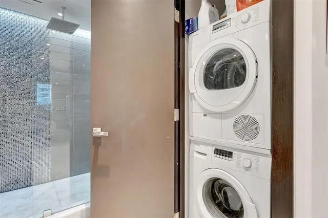 a utility room with dryer and washer