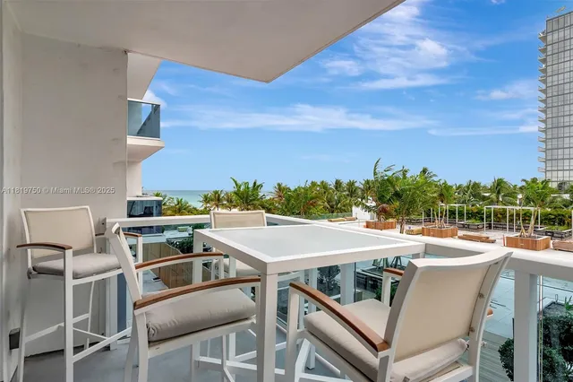 a view of a patio with swimming pool