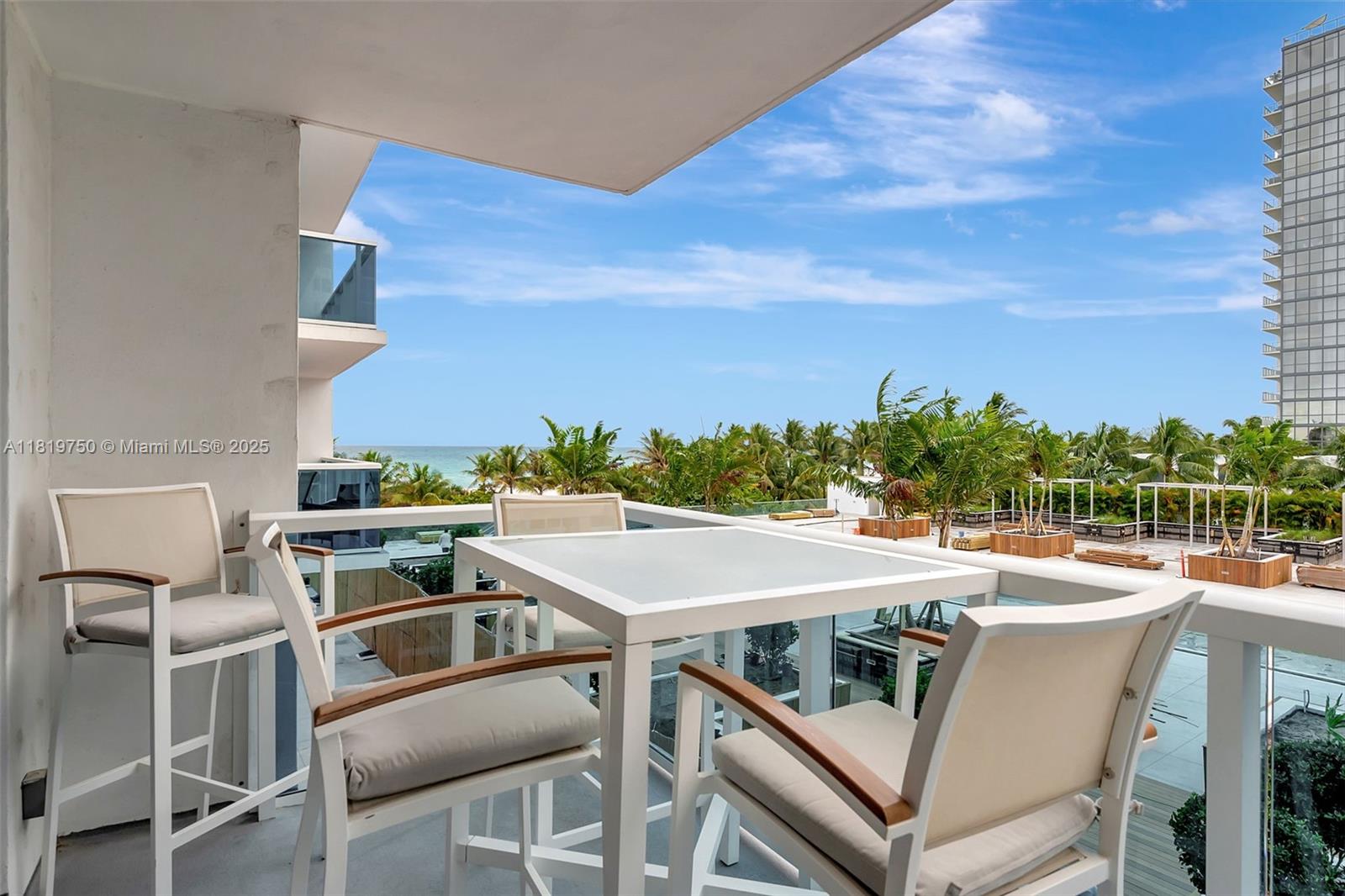 2301 Collins Avenue, Unit 307 Miami Beach, FL 33139 - Photo 15 of 17 a view of a patio with swimming pool