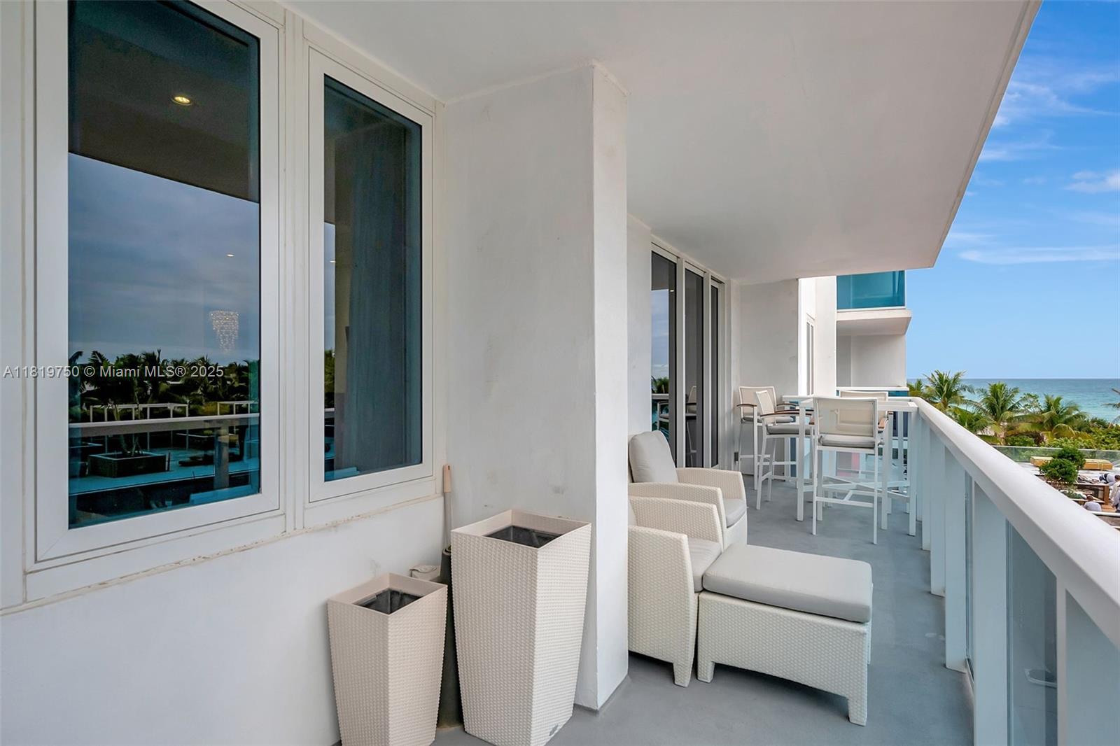 2301 Collins Avenue, Unit 307 Miami Beach, FL 33139 - Photo 16 of 17 a living room with furniture and a window