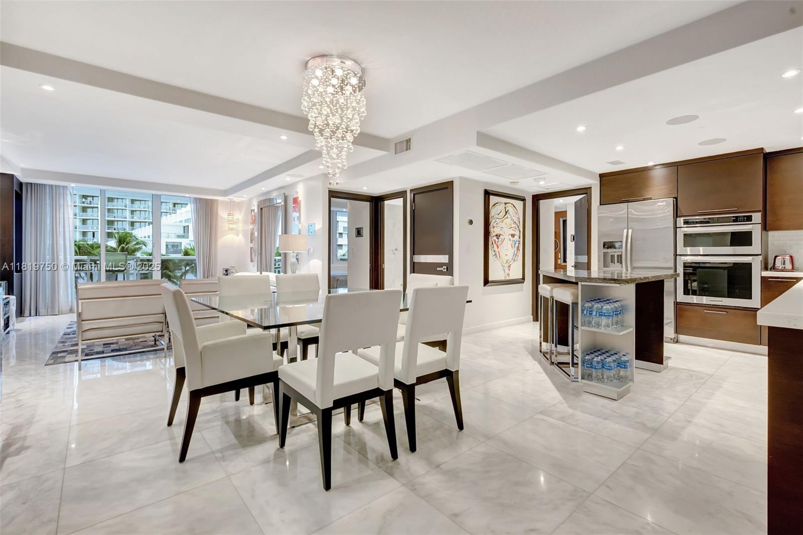 2301 Collins Avenue, Unit 307 Miami Beach, FL 33139 - Photo 3 of 17 a view of a dining room with furniture