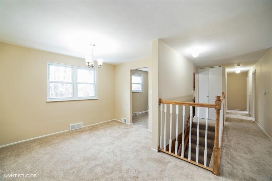 DINING ROOM & HALLWAY TO GAME ROOM & BEDROOMS