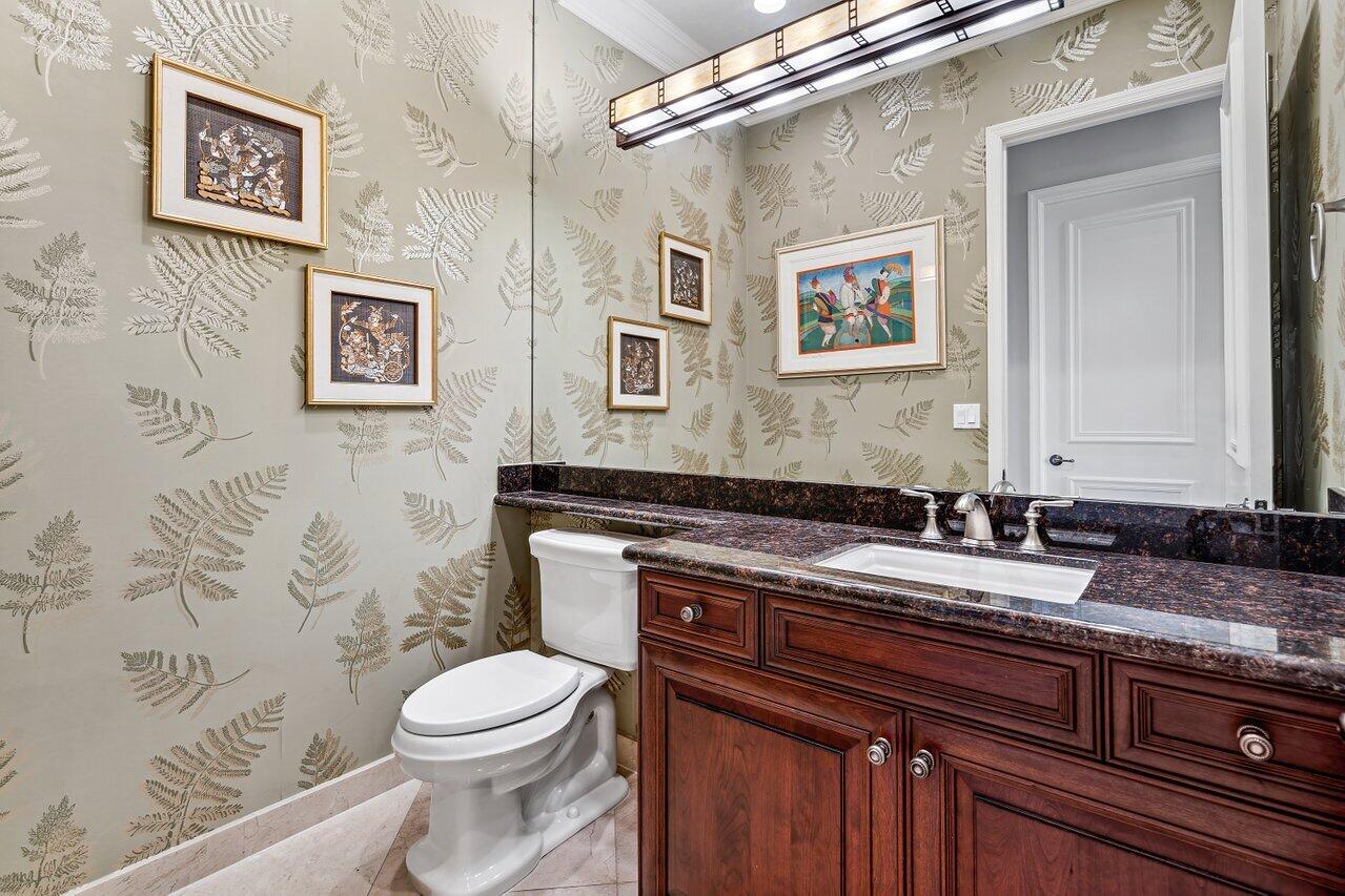 9047 Ribbons Ridge Point Boynton Beach, FL 33473 - Photo 11 of 37 a bathroom with a granite countertop sink mirror vanity and toilet
