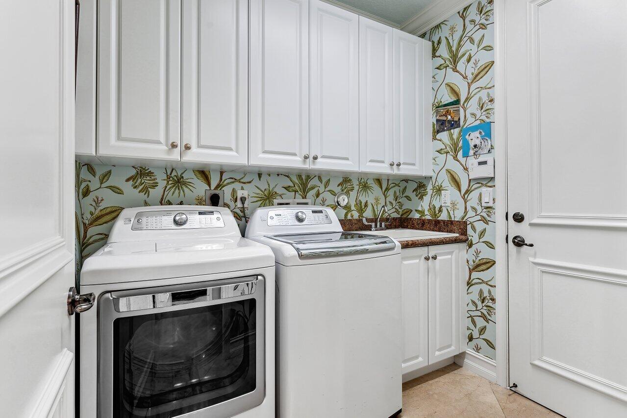 9047 Ribbons Ridge Point Boynton Beach, FL 33473 - Photo 17 of 37 a utility room with dryer and washer