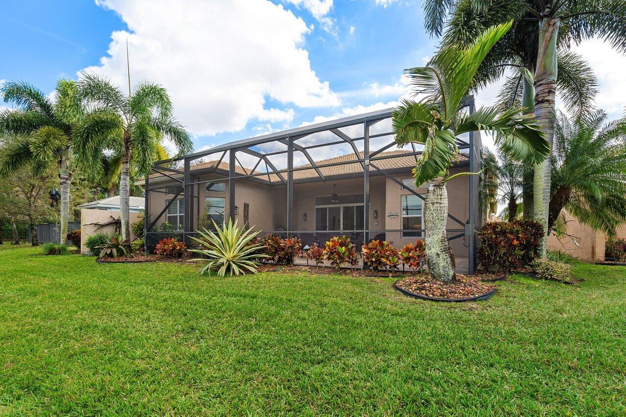 9047 Ribbons Ridge Point Boynton Beach, FL 33473 - Photo 18 of 37 a view of a house with a yard