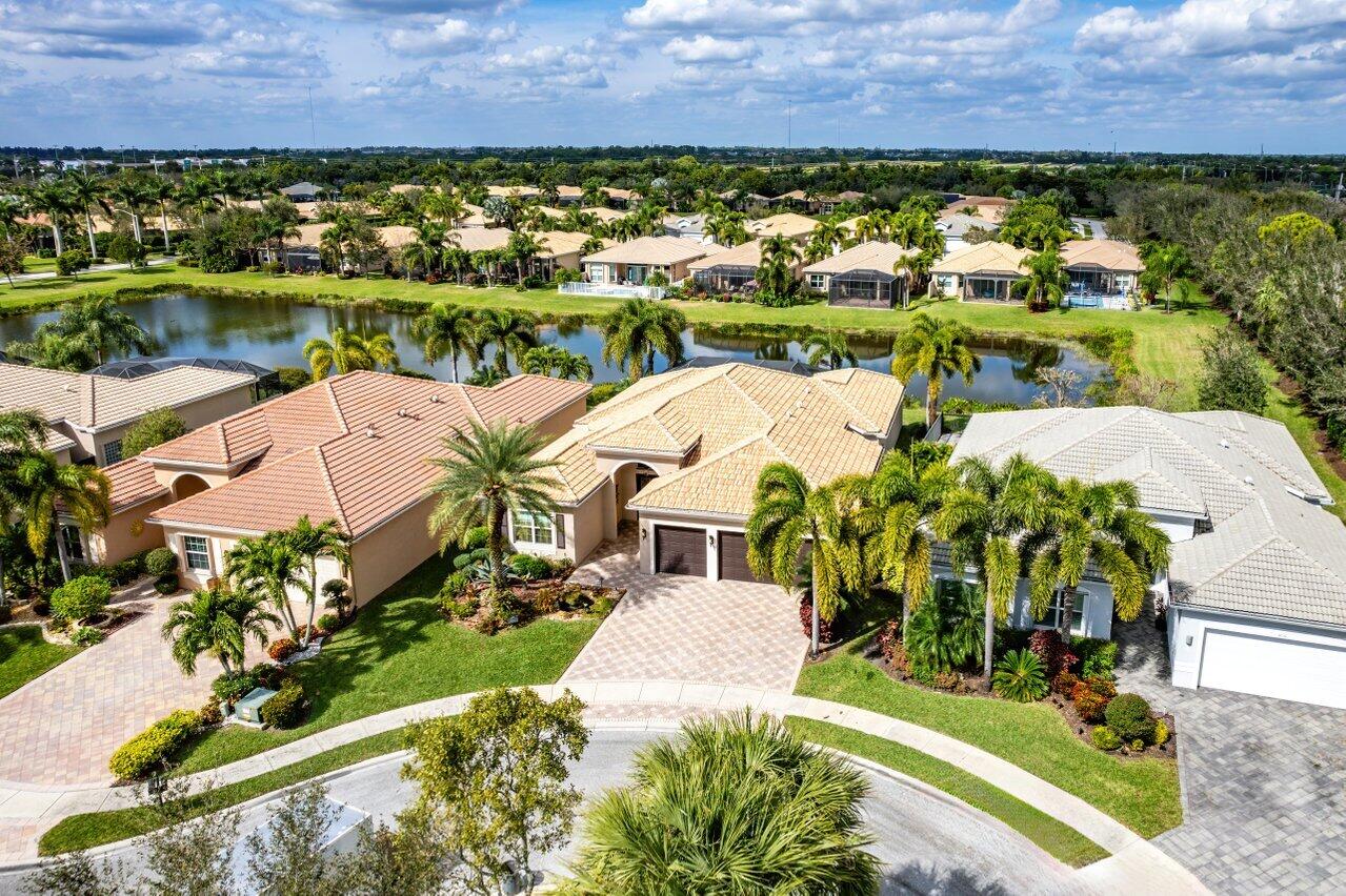 9047 Ribbons Ridge Point Boynton Beach, FL 33473 - Photo 21 of 37 an aerial view of house with a yard and lake view