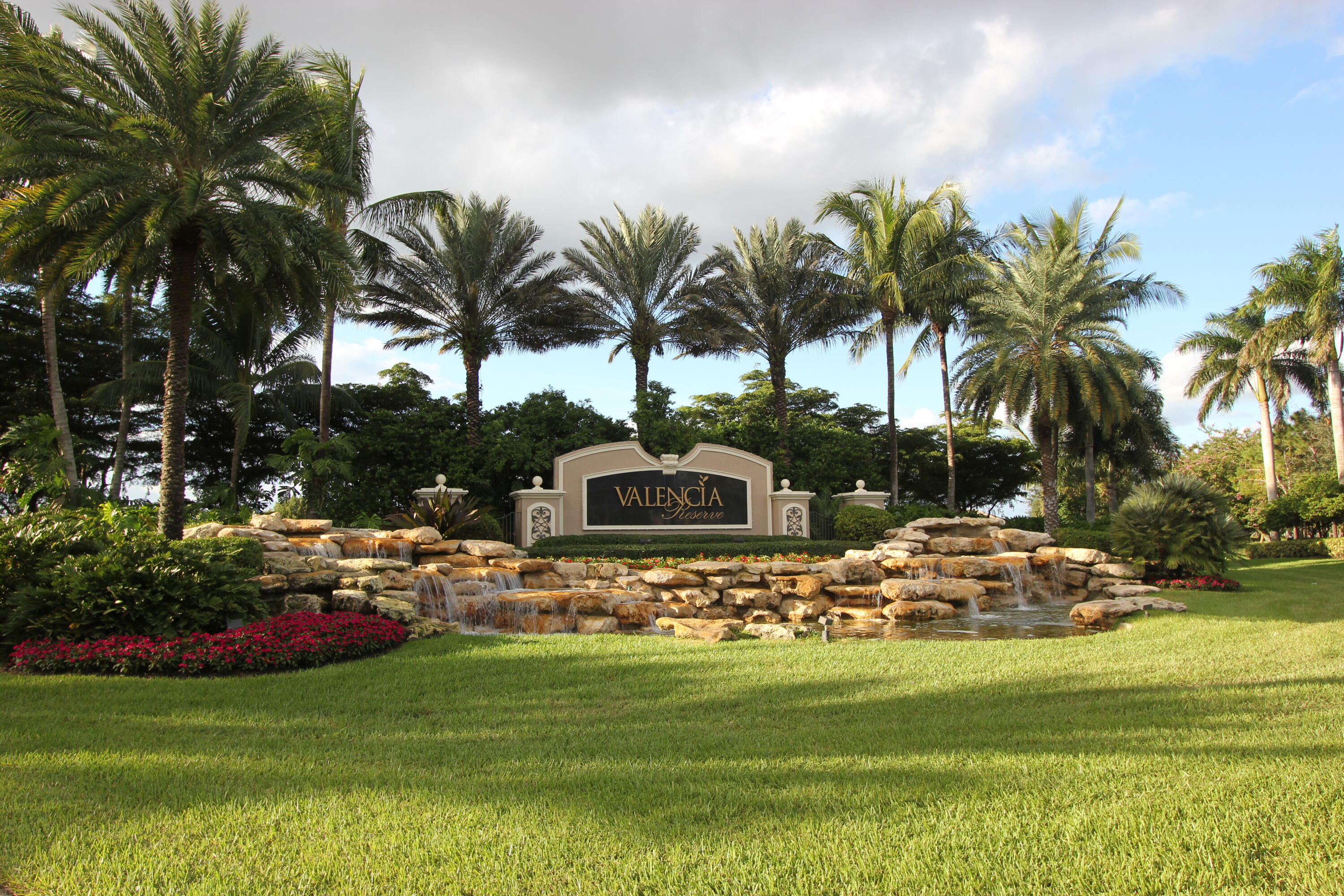 9047 Ribbons Ridge Point Boynton Beach, FL 33473 - Photo 25 of 37 a front view of a house with garden