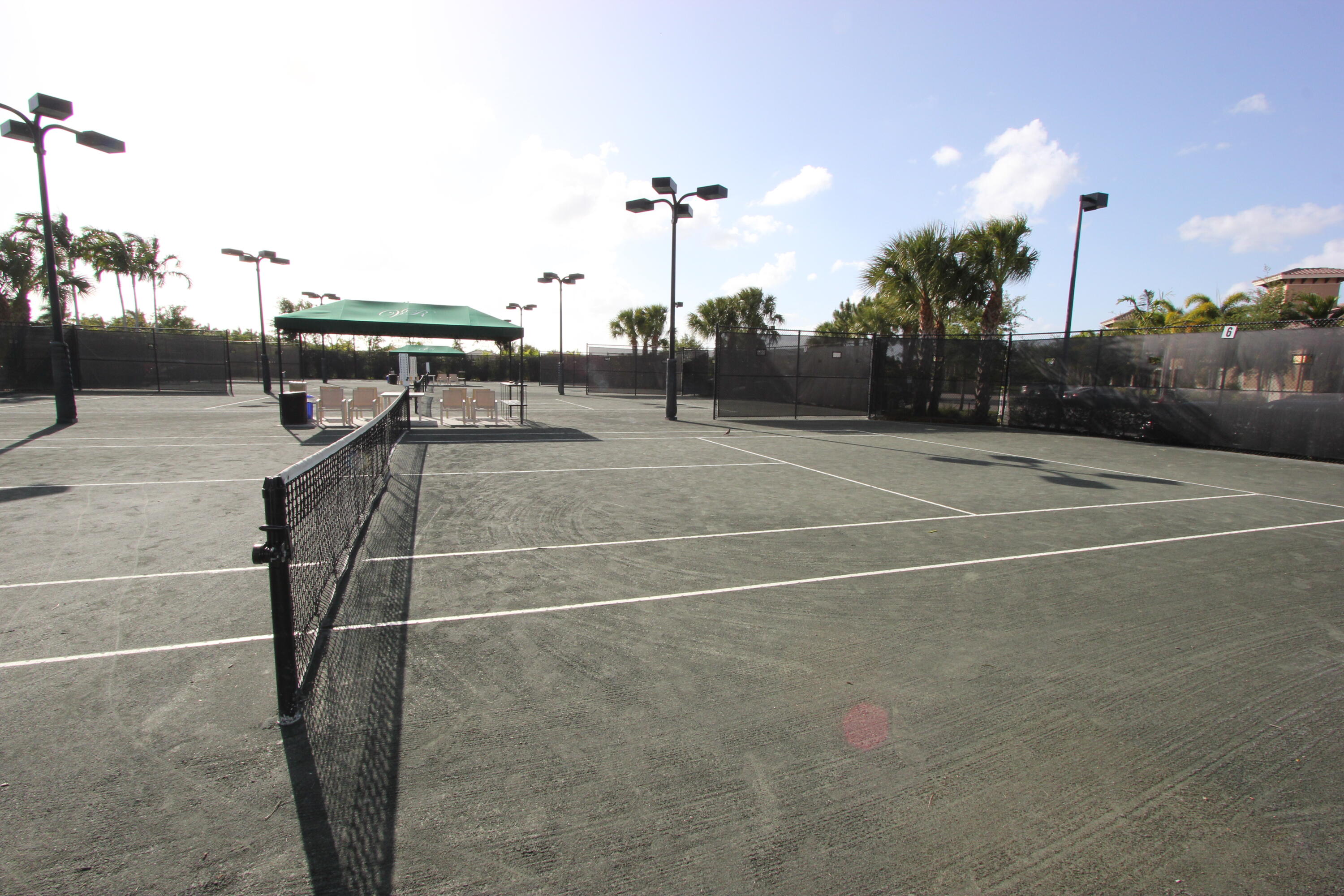 9047 Ribbons Ridge Point Boynton Beach, FL 33473 - Photo 29 of 37 a view of a tennis court