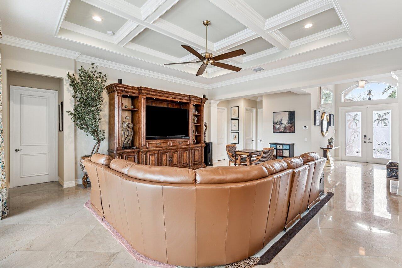 9047 Ribbons Ridge Point Boynton Beach, FL 33473 - Photo 3 of 37 a living room with furniture and a flat screen tv