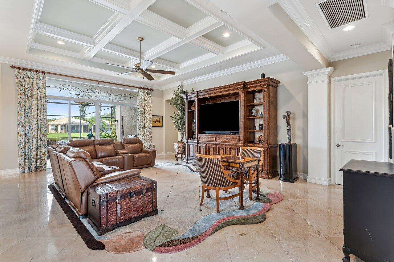 9047 Ribbons Ridge Point Boynton Beach, FL 33473 - Photo 5 of 37 a living room with furniture and a flat screen tv