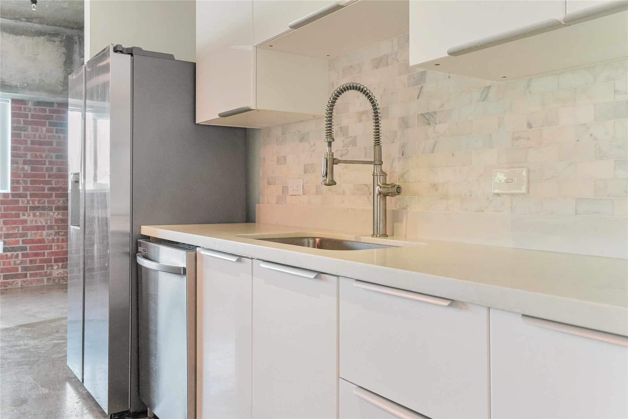 2000 Bagby Street, Unit 2401 Houston, TX 77002 - Photo 27 of 38 a close view of a sink and cabinets