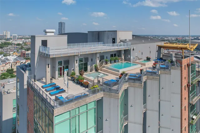 a view of an buildings from a balcony