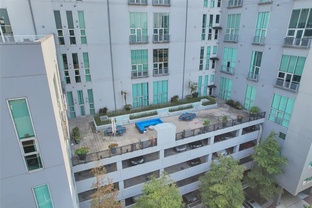 a view of a chairs and table in a patio