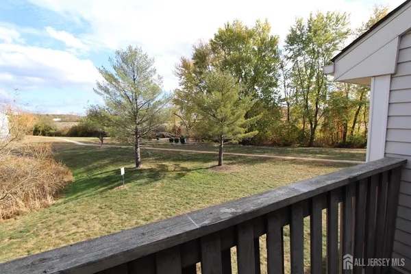 a view of wooden fence and outside space