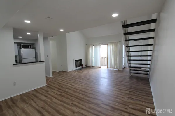 a view of kitchen and kitchen with sink