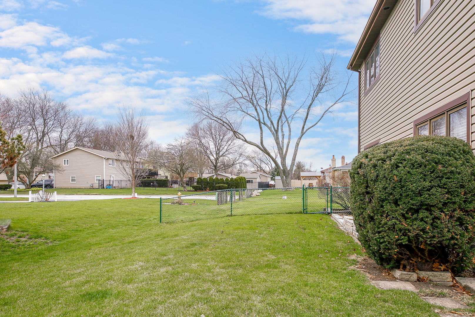 1201 Honey Hill Road Addison, IL 60101 - Photo 3 of 4 a view of a park with large trees