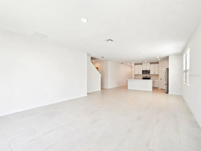 a view of a kitchen with a sink