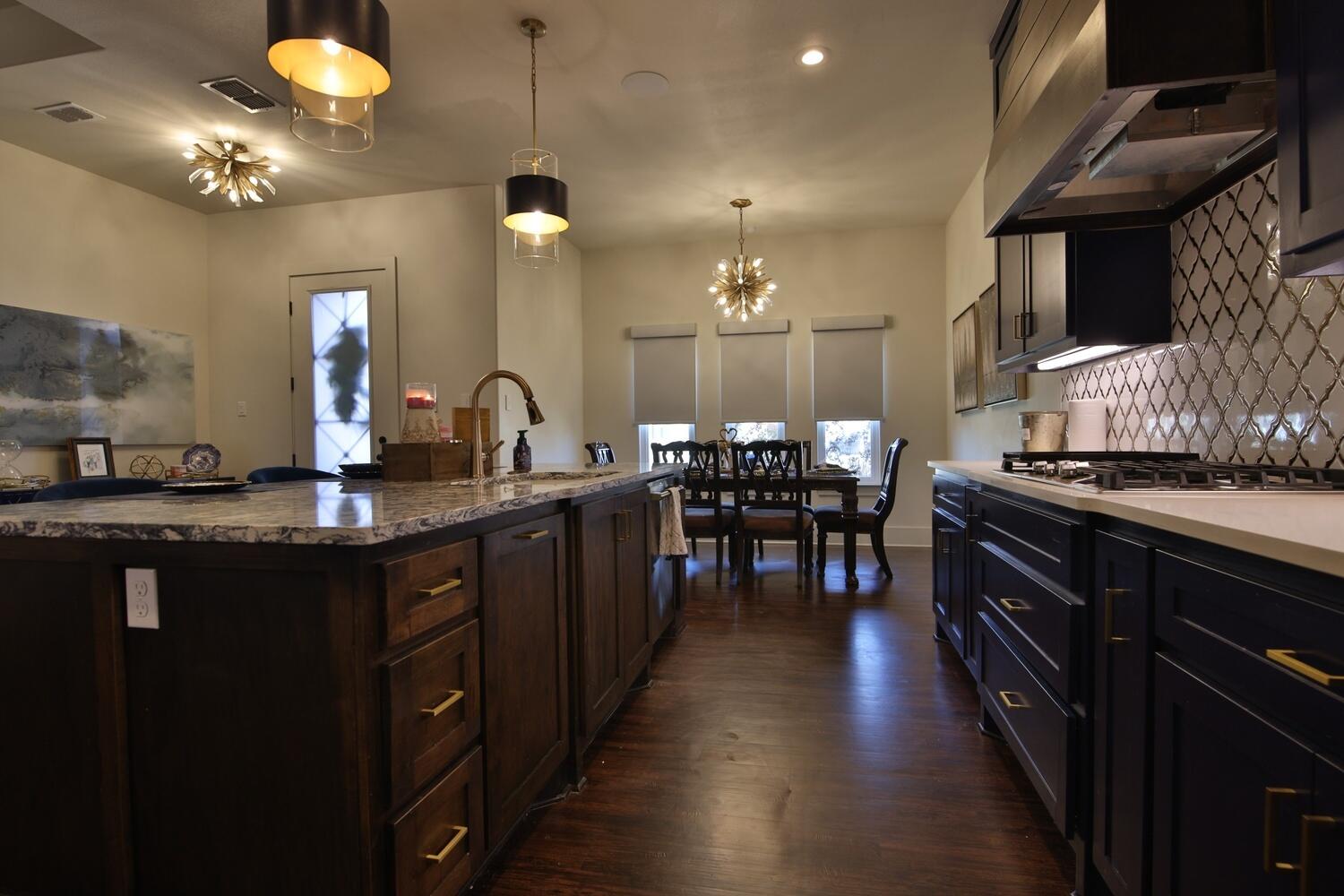 4611 139th Street Lubbock, TX 79424 - Photo 5 of 38 a kitchen with lots of counter space and sink