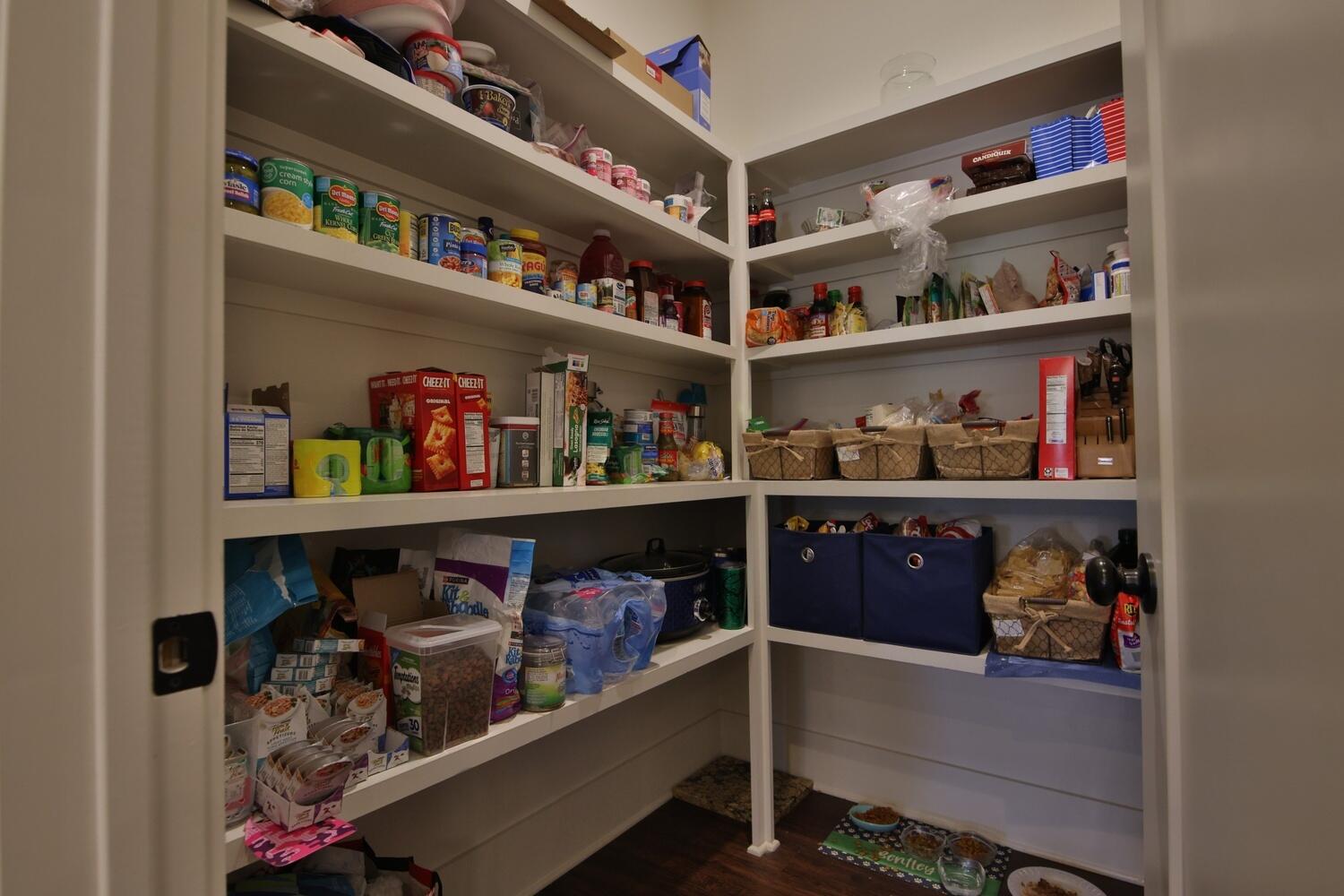 4611 139th Street Lubbock, TX 79424 - Photo 7 of 38 a room with storage and a white cabinet
