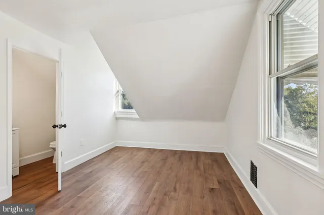 a view of entryway with wooden floor