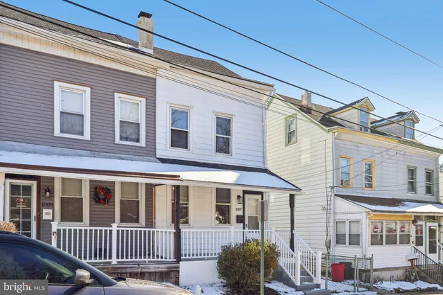 a view of a house with a porch