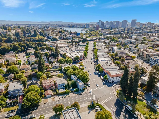 an aerial view of a city with lots of residential buildings