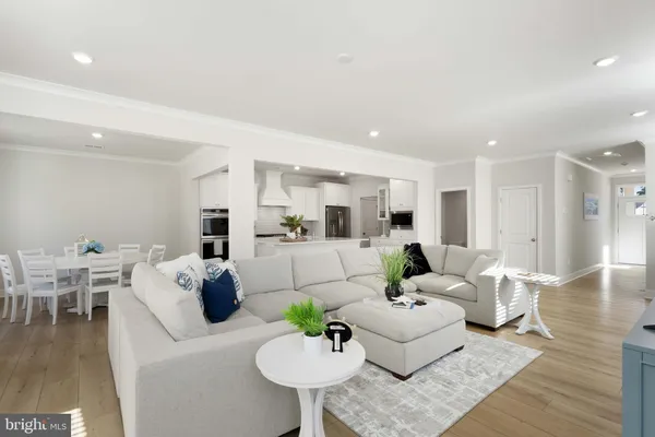 a living room with furniture and a table