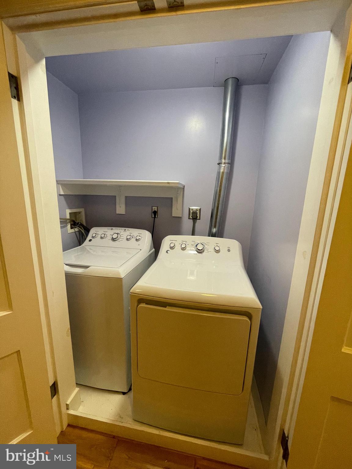 2442 20th Street Northwest, Unit B Washington, DC 20009 - Photo 11 of 15 a utility room with dryer and washer