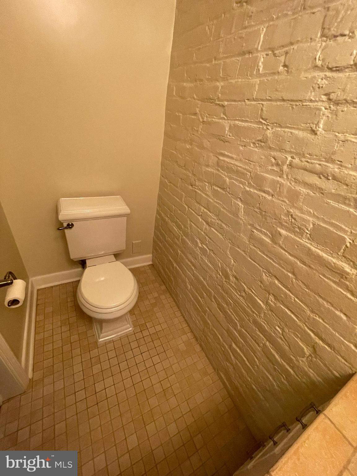 2442 20th Street Northwest, Unit B Washington, DC 20009 - Photo 13 of 15 a bathroom with a toilet