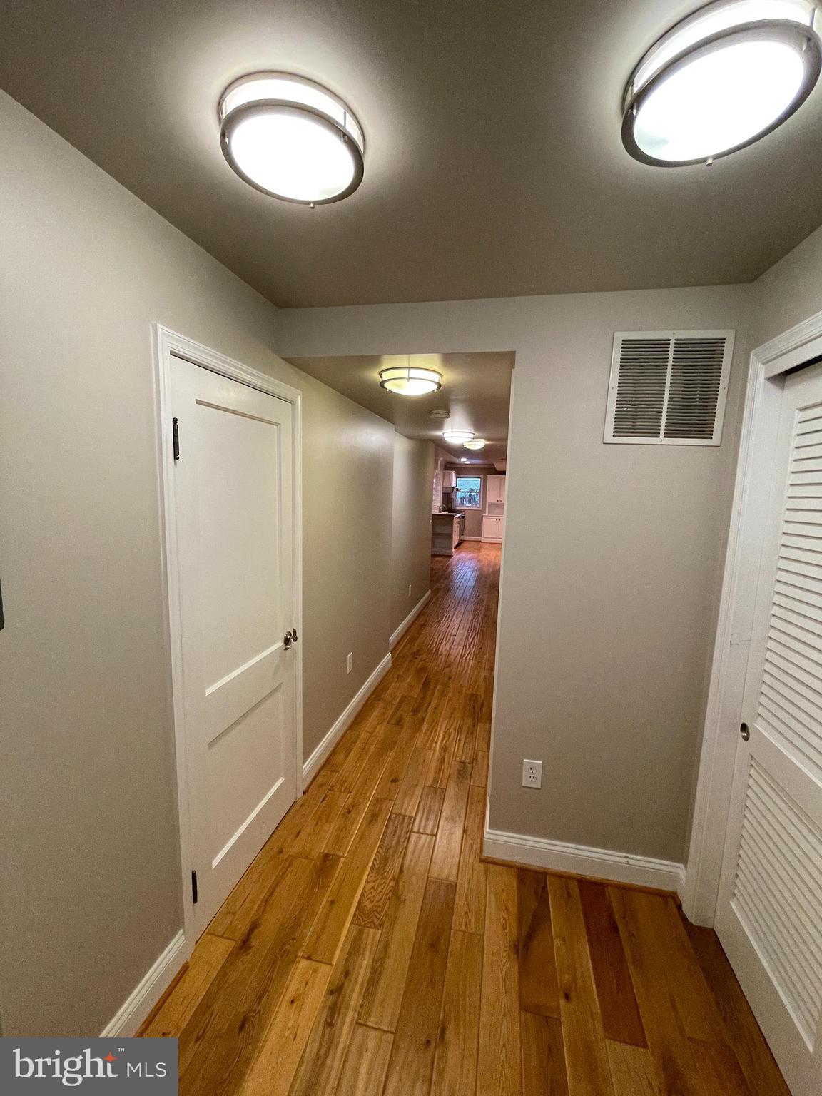 2442 20th Street Northwest, Unit B Washington, DC 20009 - Photo 3 of 19 a view of a room with wooden floor